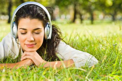girl wearing headphones listening to music
